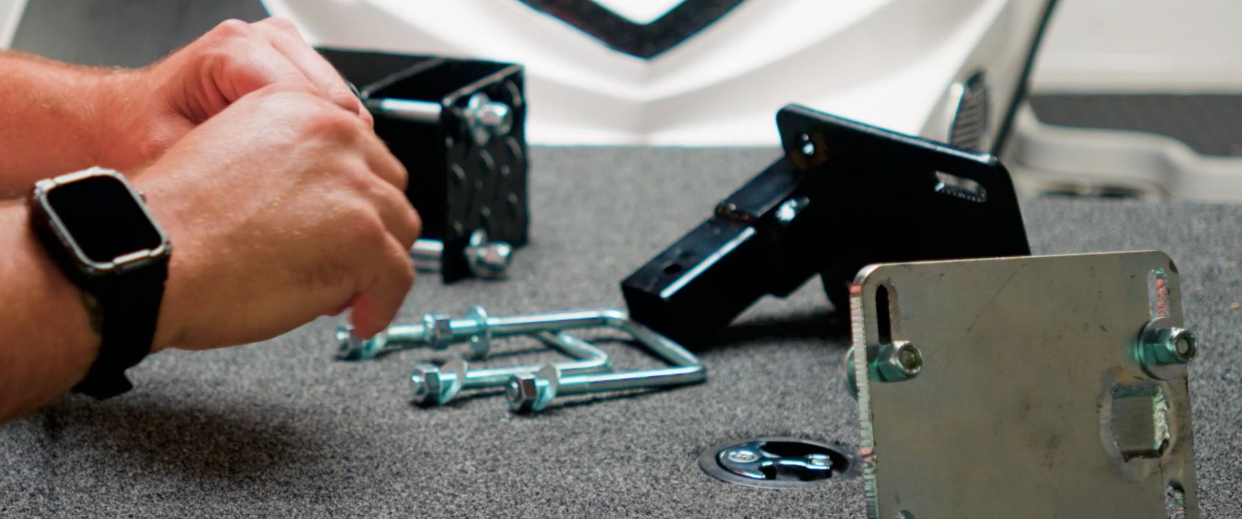 Jack Bracket receivers and U bolts laid out on a boat deck